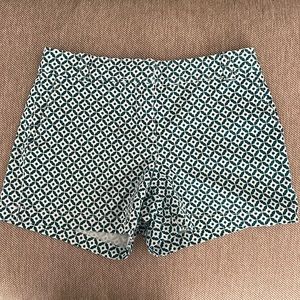 green & white pattern shorts